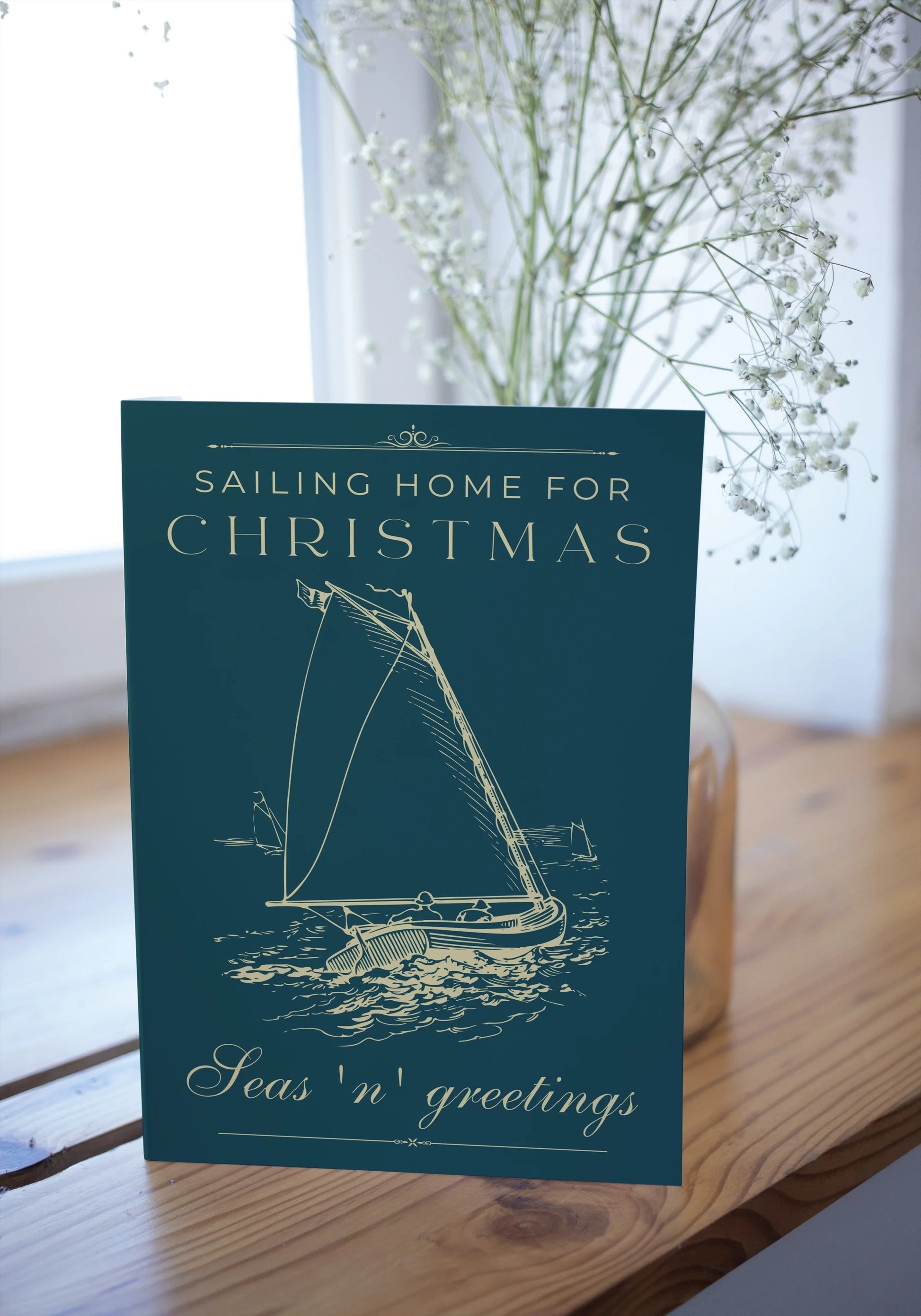 Nautical Christmas card, Seas 'n' greetings sailing home. Great Harbour Gifts